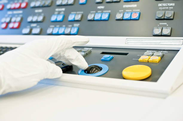 istock Hand Operating A Colourful Joystick Of A High Resolution Scanning Electron Microscope Console 952787668