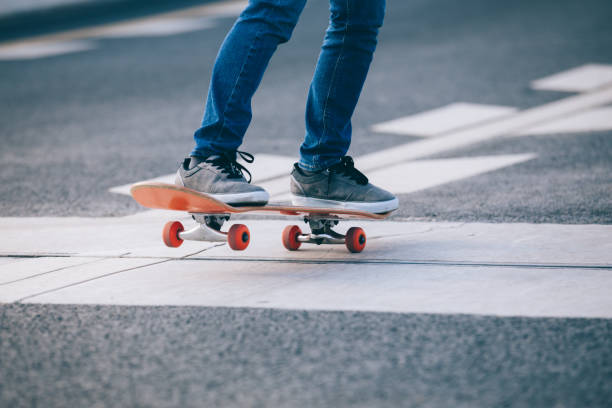 istock Skateboarder sakteboarding on city highway 952792656