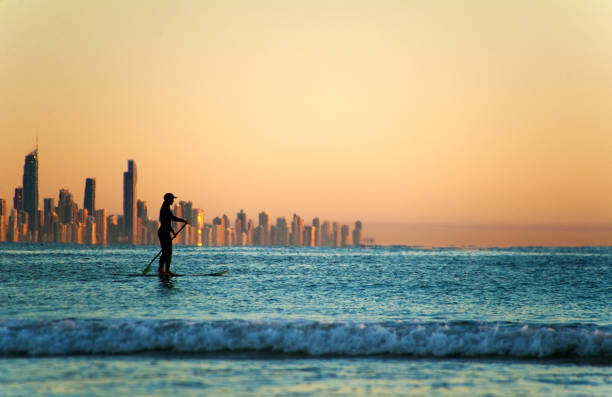 istock Single paddler against the Gold Coast skyline at sunset. 952792888