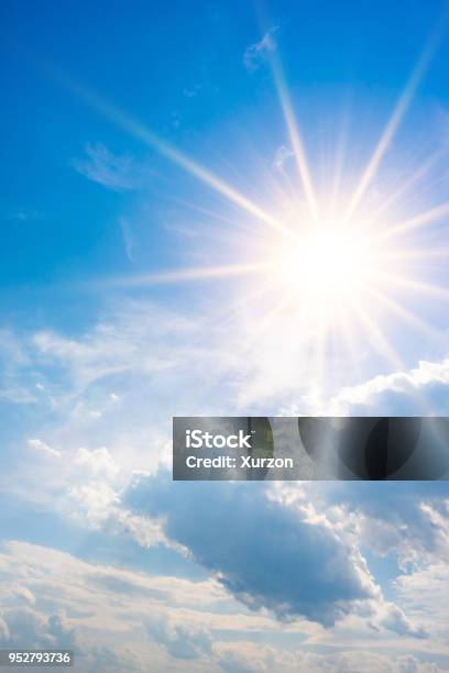 Blue Sky With Bright Sun And Clouds Stock Photo - Download Image Now - Sunlight, Sun, Sky