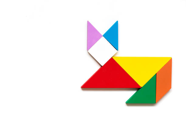 istock Color wood tangram puzzle in cat shape on white background 952801792