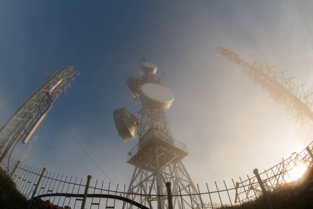 istock telecommunication towers with microwave antenna in sunrise 952805188