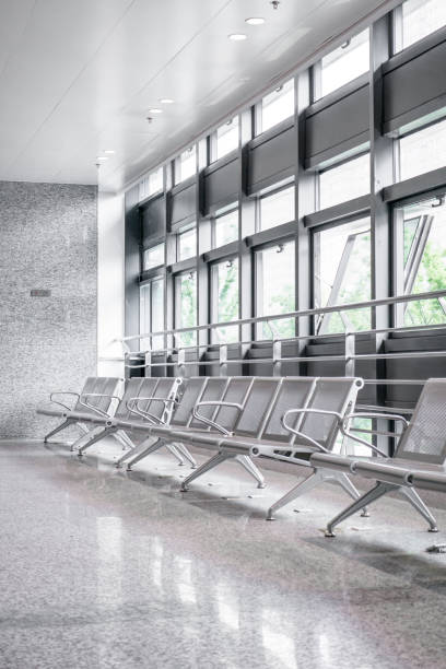 istock Empty metal chairs in the airport lounge 952805440