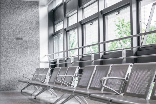 istock Empty metal chairs in the airport lounge 952805532