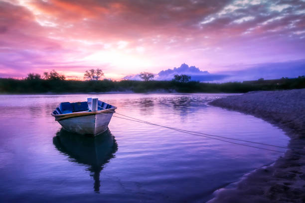 istock Boat stop on sea at sunset. 952807974