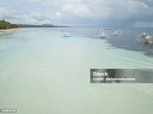 Aerial View Of Happy Man Relaxing In Tropical Sea Beach Vacations Concept Stock Photo - Download Image Now