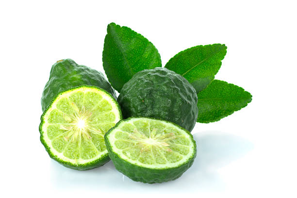 Citrus hystrix and green leaf on white background.