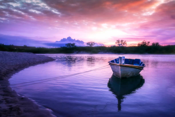 istock Boat stop on sea at sunset. 952822924