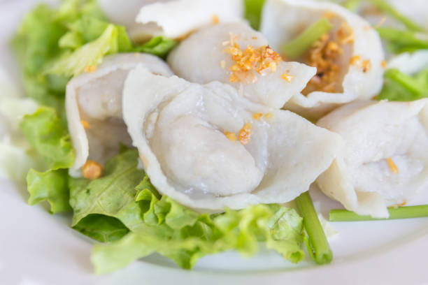 istock Steamed dumplings on white plate 952827834