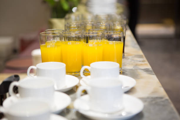 istock coffee cup and orange juice 952836138