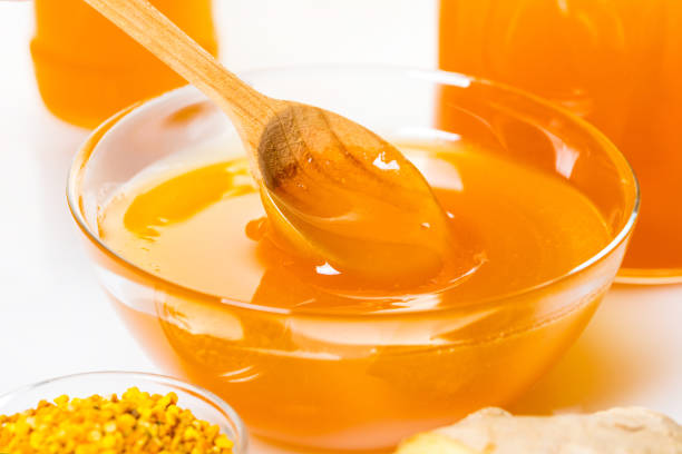 organic honey with spoon close-up