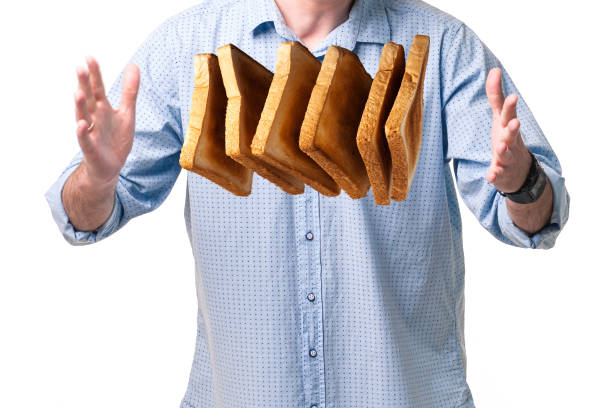 istock A man magically controls his hands flying toasts 952844620