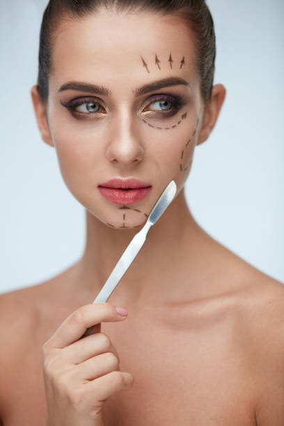 istock Plastic Surgery Operation. Beautiful Woman With Lines On Face 952848142