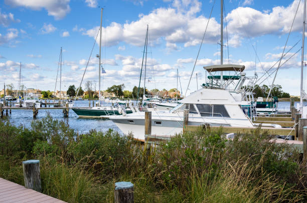 Yachts Moored to Wooden Piers on a Clear Autumn Day View of a Harbour with Yachts Moored to Wooden Piers under Blue Sky. St. Michaels, MD. 2273 stock pictures, royalty-free photos & images