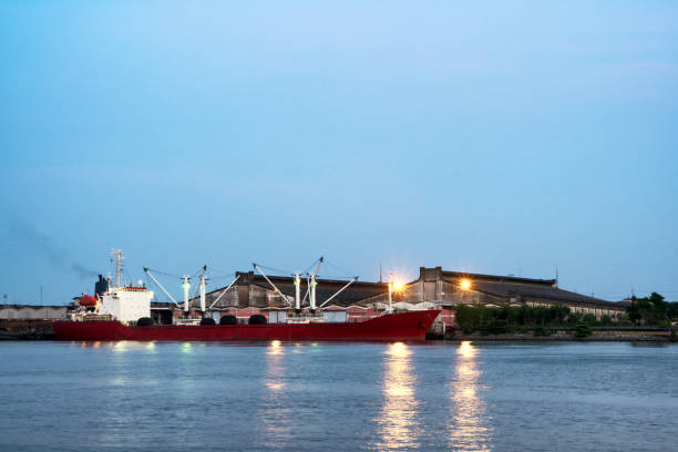 istock Industrial port with grain elevator and ships 952865020