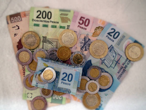 istock Mexican Currency Notes And Coins Scenery In Mexico 952865880