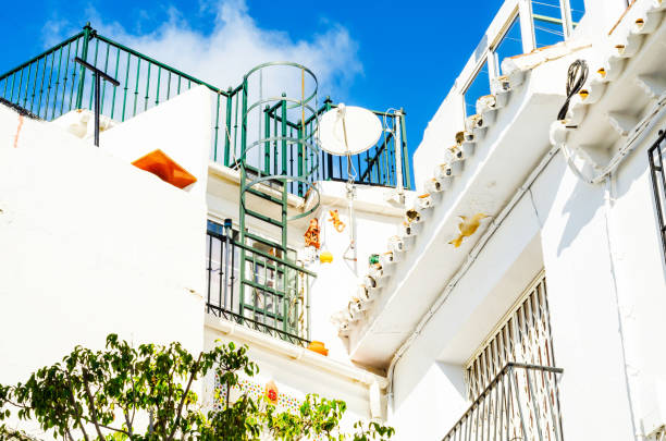 istock Stylish balcony with a metal railing, solid architectural element, a place of rest and relaxation, vintage decor 952886694