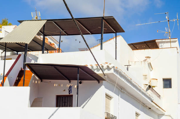 istock Stylish balcony with a metal railing, solid architectural element, a place of rest and relaxation, vintage decor 952887098