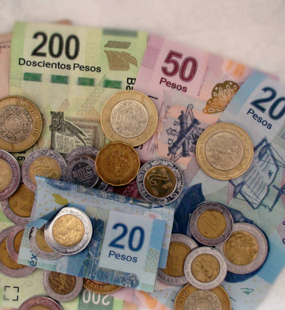istock Mexican Currency Notes And Coins Scene In Mexico 952894116