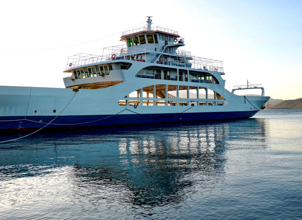 istock White ferry boat is in the harbor 952897024