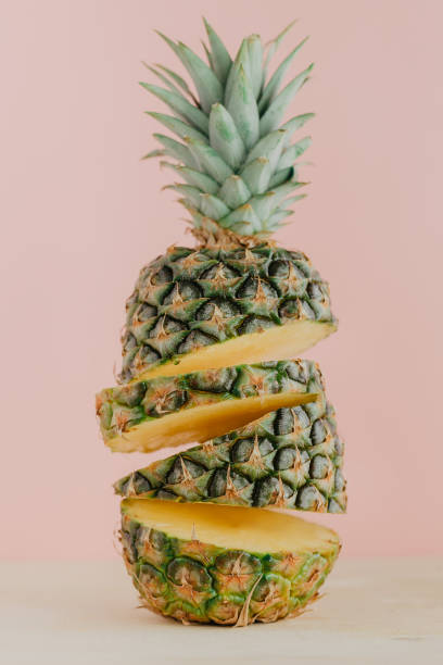 istock Colorful sliced pineapple on pink 952898280
