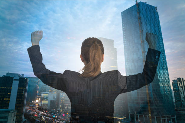 istock Excited executive raising arms after success 952913784