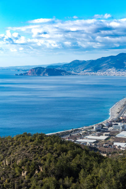 istock Mediterranean seascape with mountains and coastal town 952918050