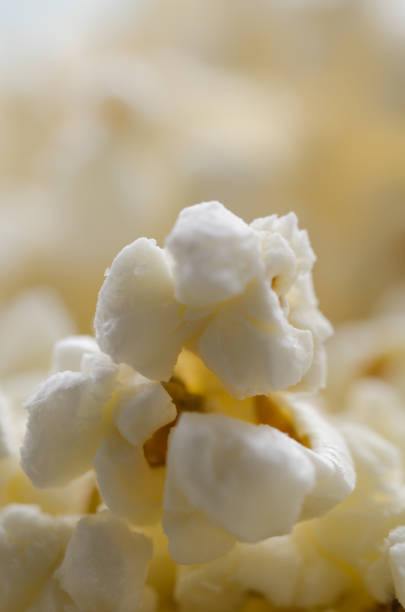 Popcorn in the bowl. Top view.On the table.