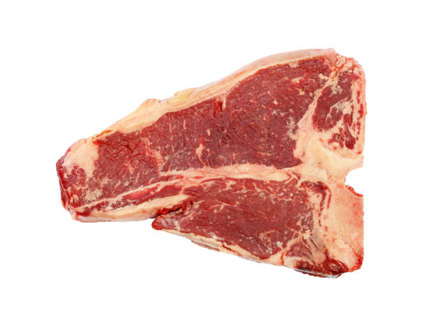 istock Close up raw beef T-bone steak isolated on white 952927108