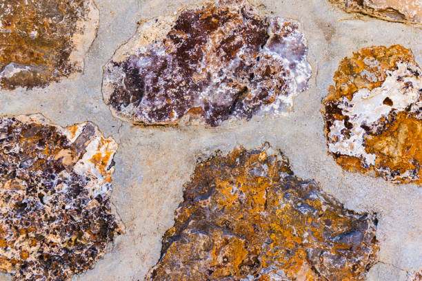 old stone placed in the wall, interesting and original background, solid wall