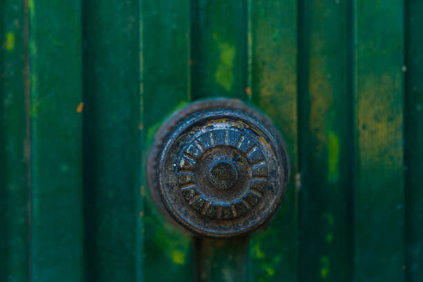 close up on a round door handle with decorative elements, door decoration, vintage