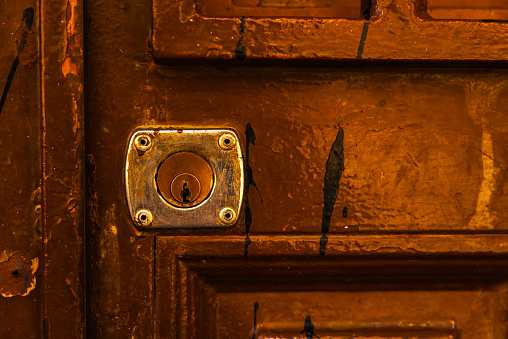 old door lock, aged wooden door, home security, vintage