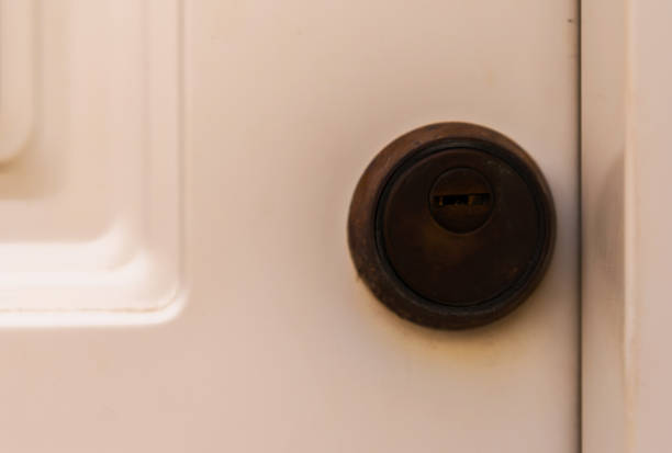 istock old door lock, aged wooden door, home security 952934536