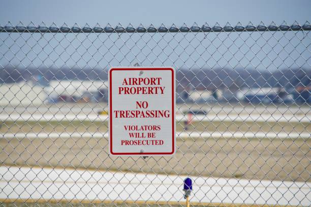 istock Airport Property No Trespassing Violators Will Be Prosecuted Sign 952939404