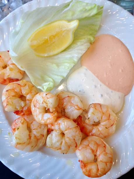 istock Gourmet shrimp with dip sauce and salad 952940596