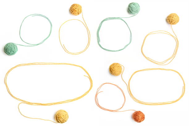 istock Set of color thread balls with frames made of threads isolated on white background. 952940618