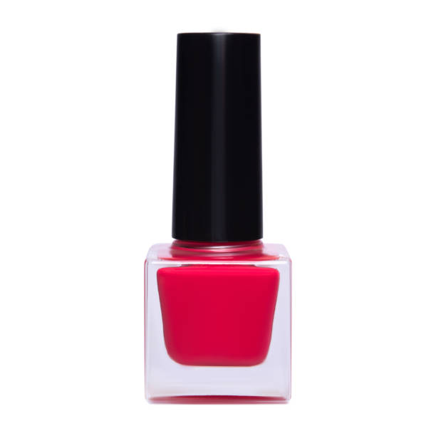 istock A bottle of red nail polish is isolated on white background 952947876