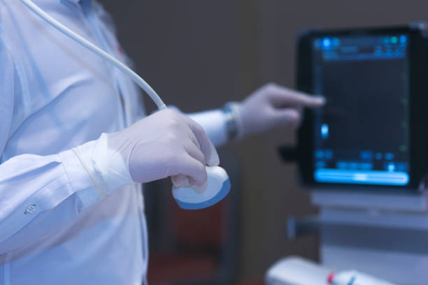 Ultrasound medical device for diagnosis, doctor touching the screen stock photo