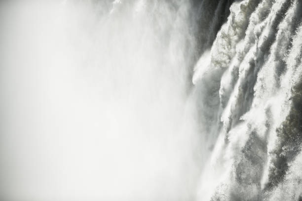 A zoomed in close-up view of the Victoria Falls also called Mosi-oa-Tunya at it's the highest level in full flood on the Zambian side in Southern Africa