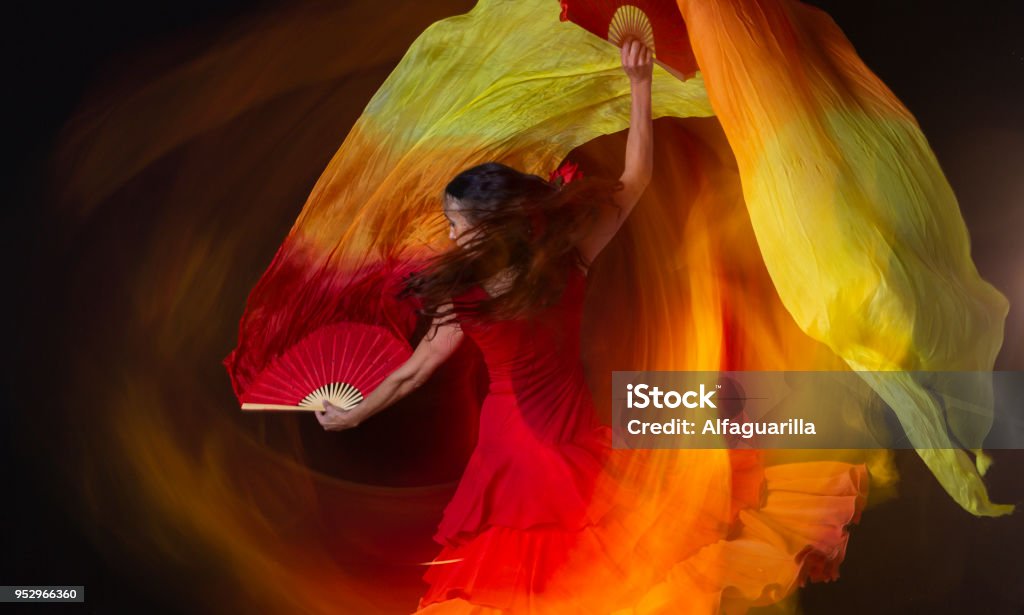 Spanish flamenco dancer woman Carmen is a professional flamenco dancer who lives and works in tablaos de Granada Flamenco Dancing Stock Photo