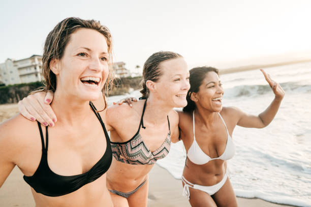 istock Confident women at the beach 952968948