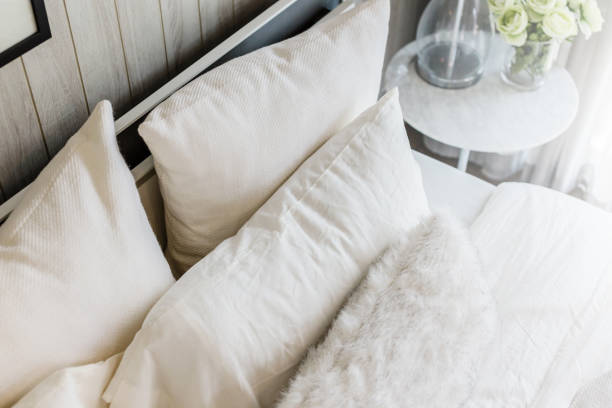 istock light soft pillow on beautiful bed cozy bedroom with sun light from window interior concept 952969376
