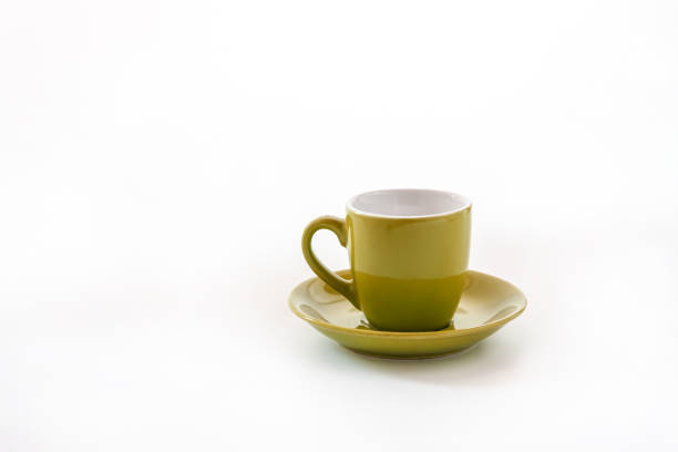 istock cup and saucer isolated on white background 952969418