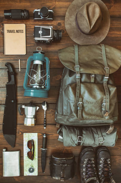 istock Hiking stuff arranged on wooden floor 952970056