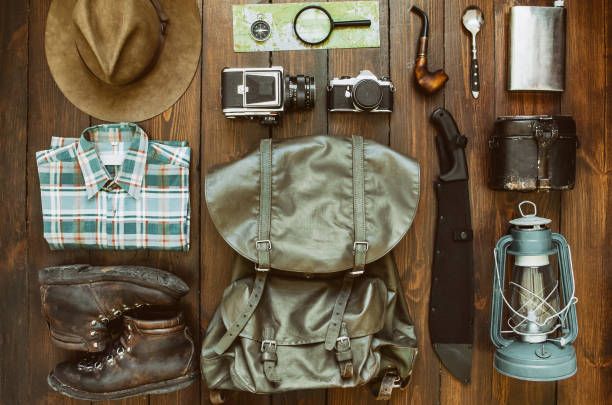 istock Hiking stuff arranged on wooden floor 952970062