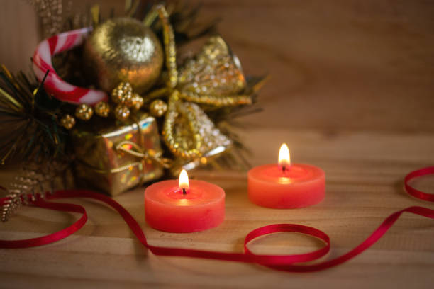 istock Christmas decoration with red candles burning 952970908