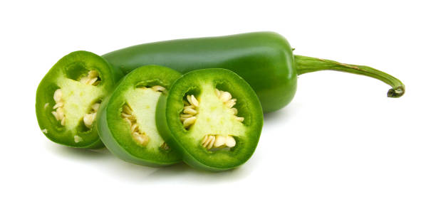 istock A pile of finely chopped chilli peppers on a white background 952978002
