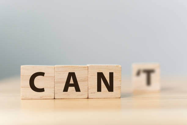 istock Personal development and career growth or change attitude yourself concept. Wood block cube with word CAN and CAN’T 952980524