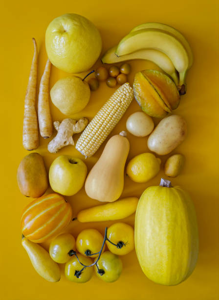 Yellow fruits and vegetables Looking down on monochrome yellow fruits and vegetables melon photos stock pictures, royalty-free photos & images