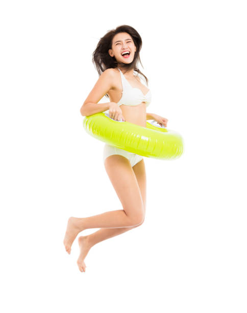 beautiful girl in bikini and jumping
